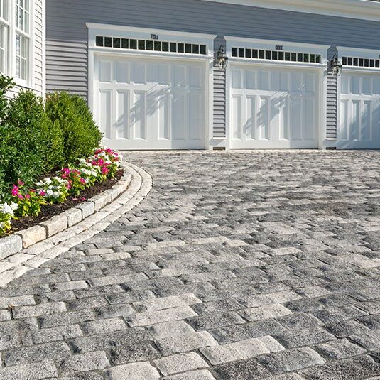 variety of driveway materials showcasing durability, aesthetics, and longevity.